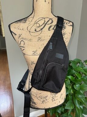 Vera Bradley Black Crossbody Sling Bag could also be used by a man for travel